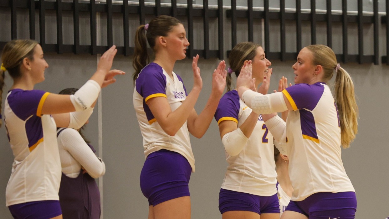 volleyball team celebrating