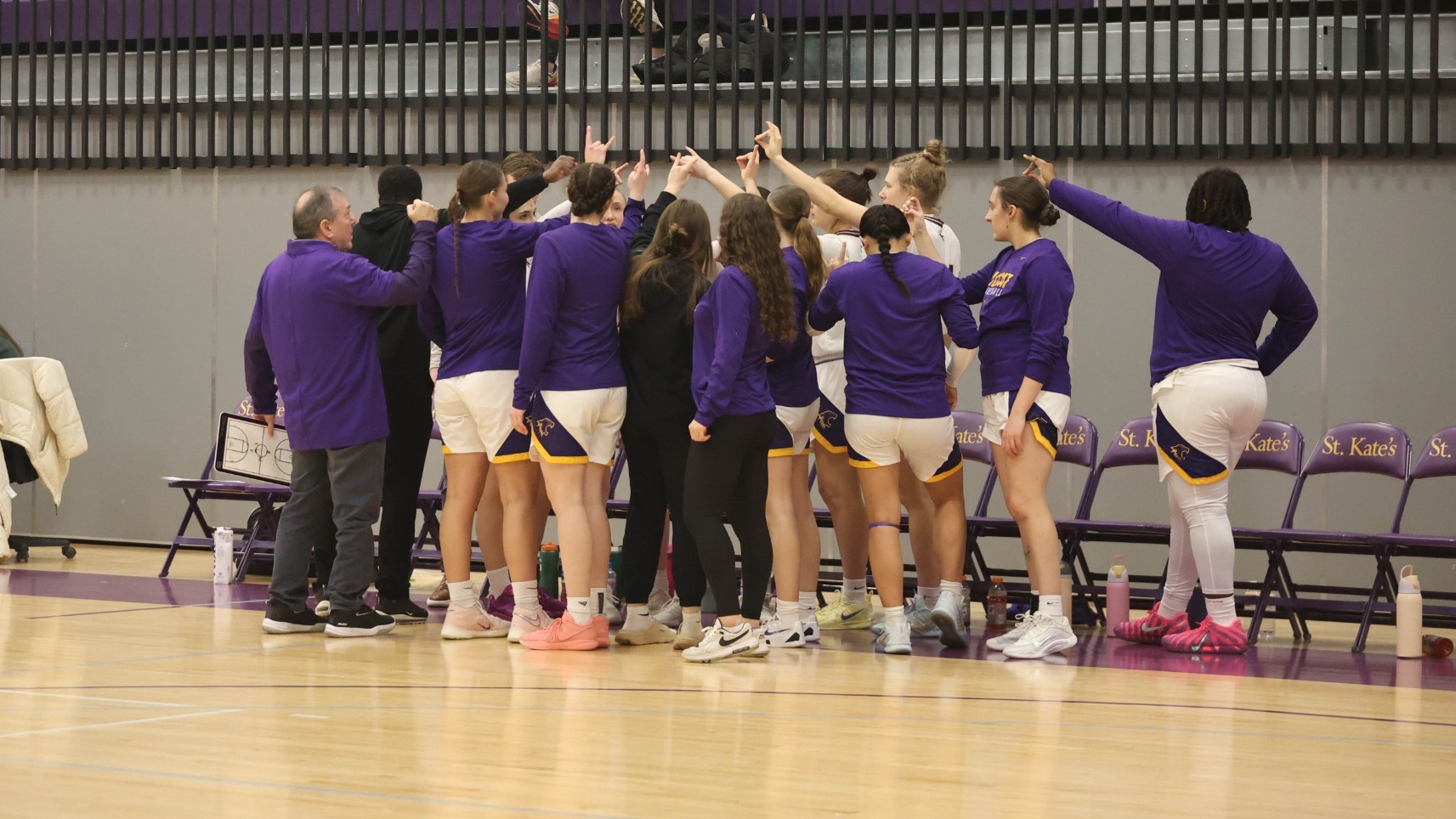 Basketball team huddle 