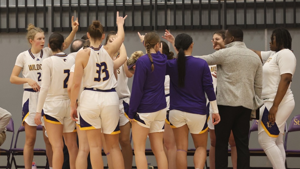 Basketball team huddle