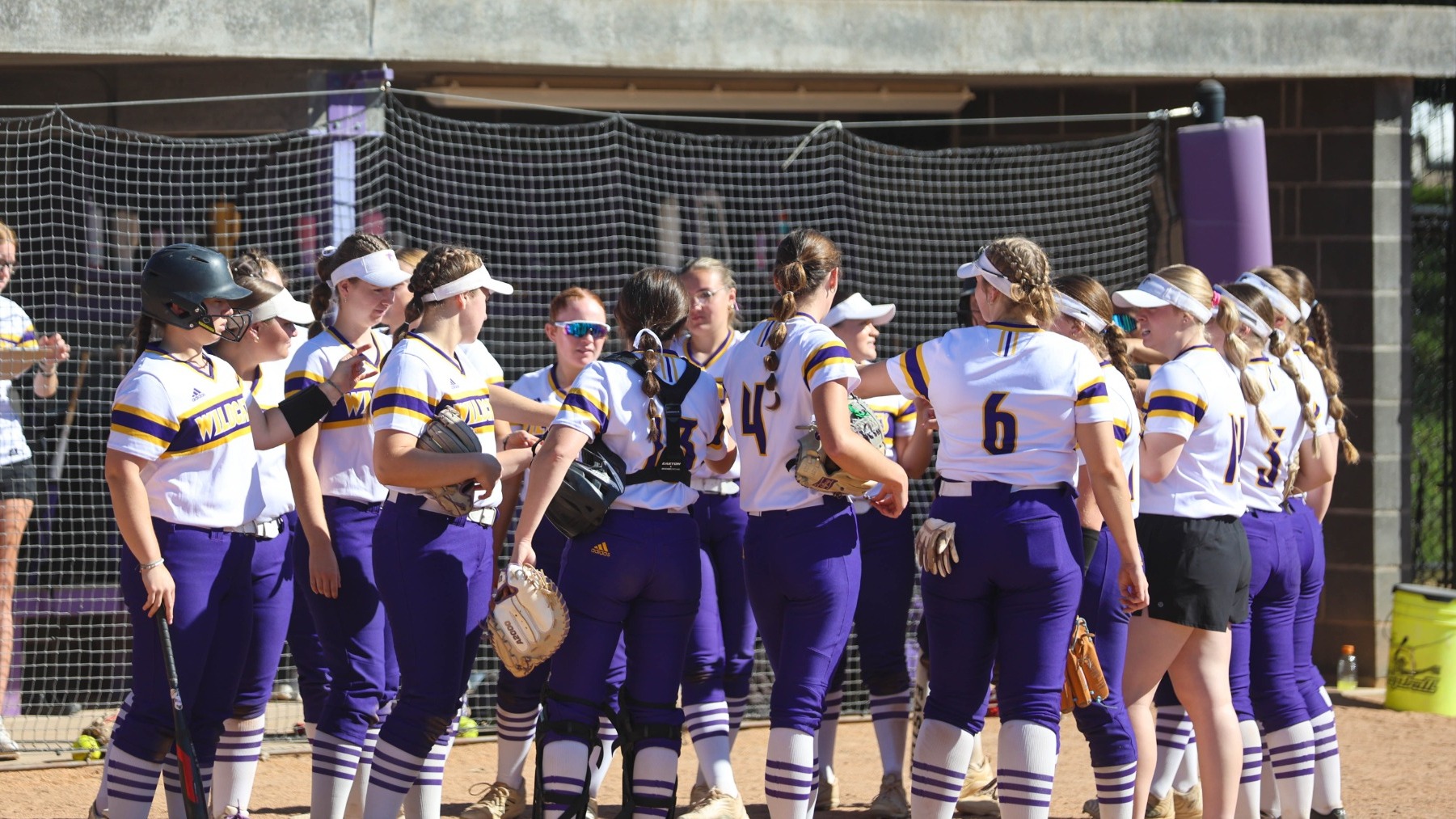 Softball team huddle