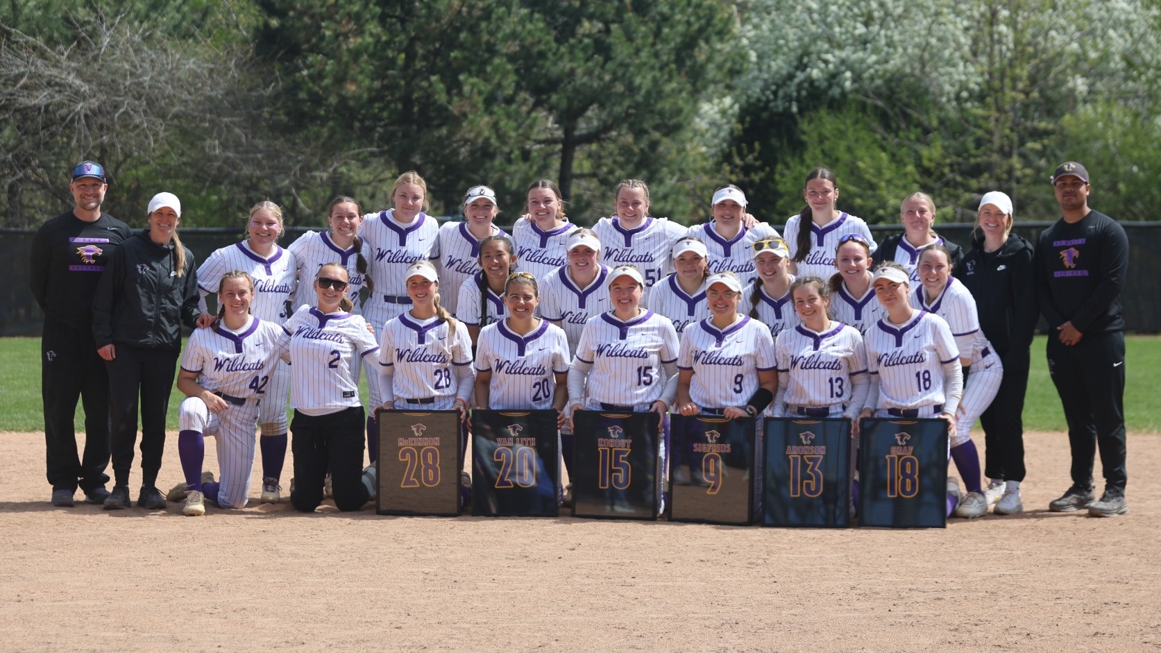 2026 softball graduating class and coaches on senior day