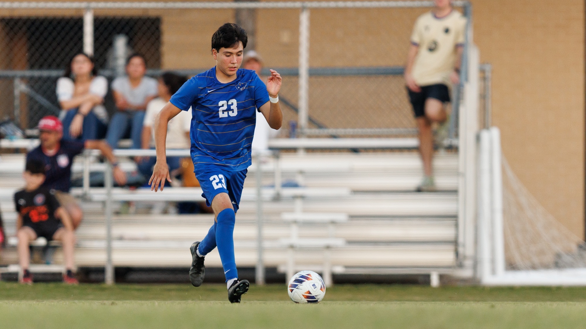 Gael Gallegos drives with the ball on his right foot.