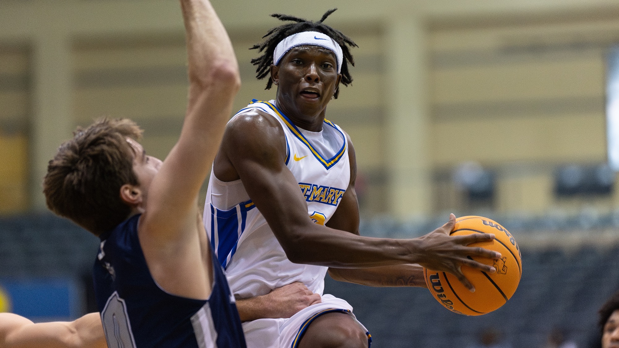 Wayne Wiggins goes up for a shot with a defender pushing on him.