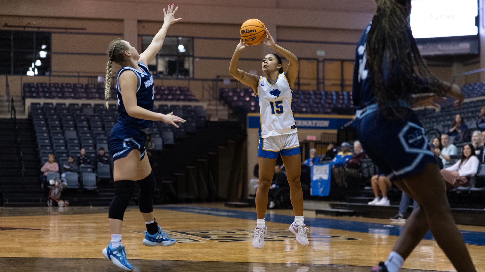 Allie Garcia shoots a three-pointer.