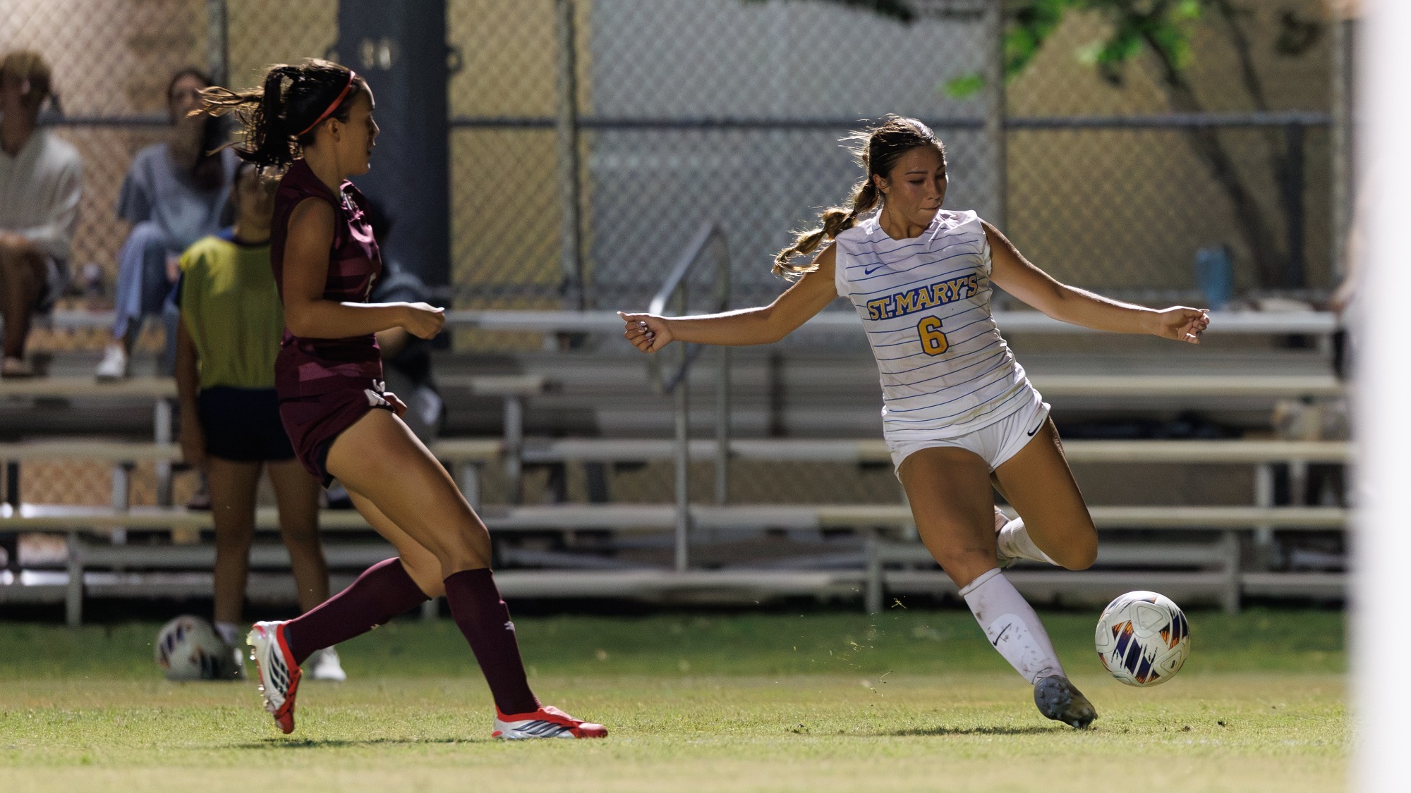 Natalya Hendrus kicks the ball against West Texas A&M