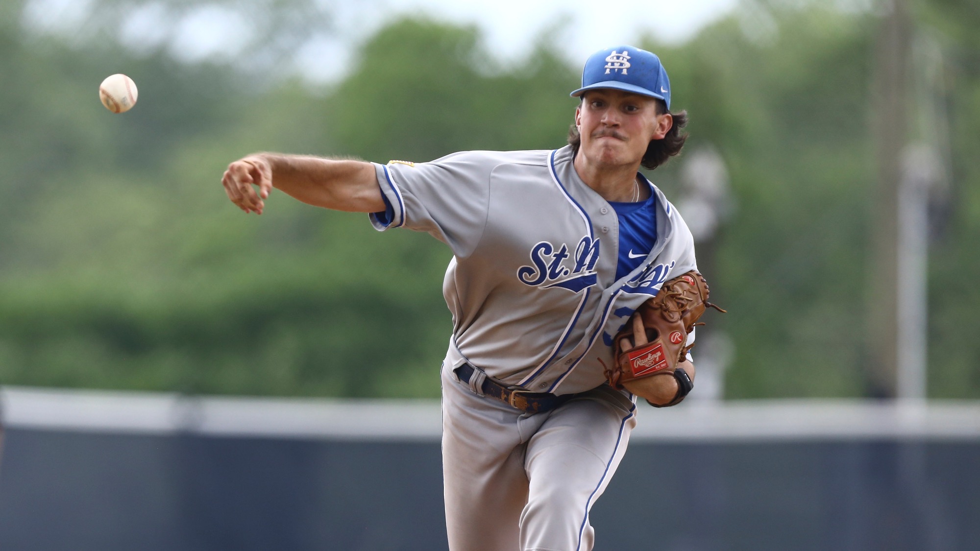 Brandon Vasquez delivers a pitch to home plate.
