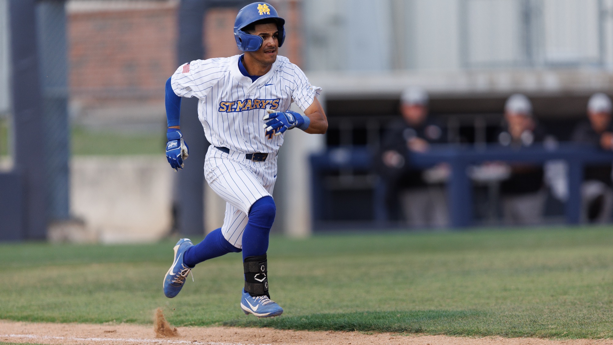 Matt Gauna sprints down the first base line.