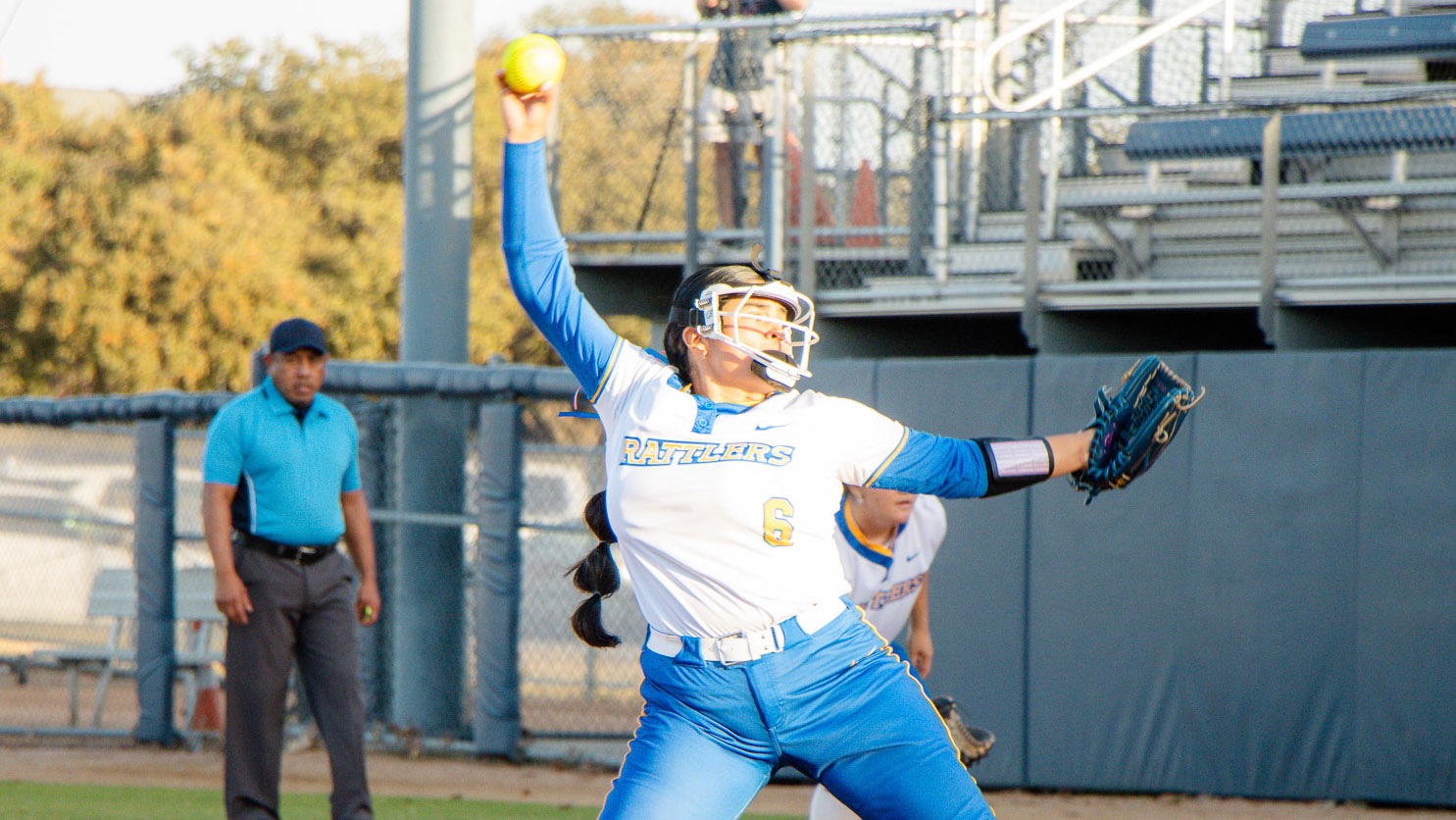 Ariella Saenz is in the upper most point of her windmill in delivering a pitch to home plate.