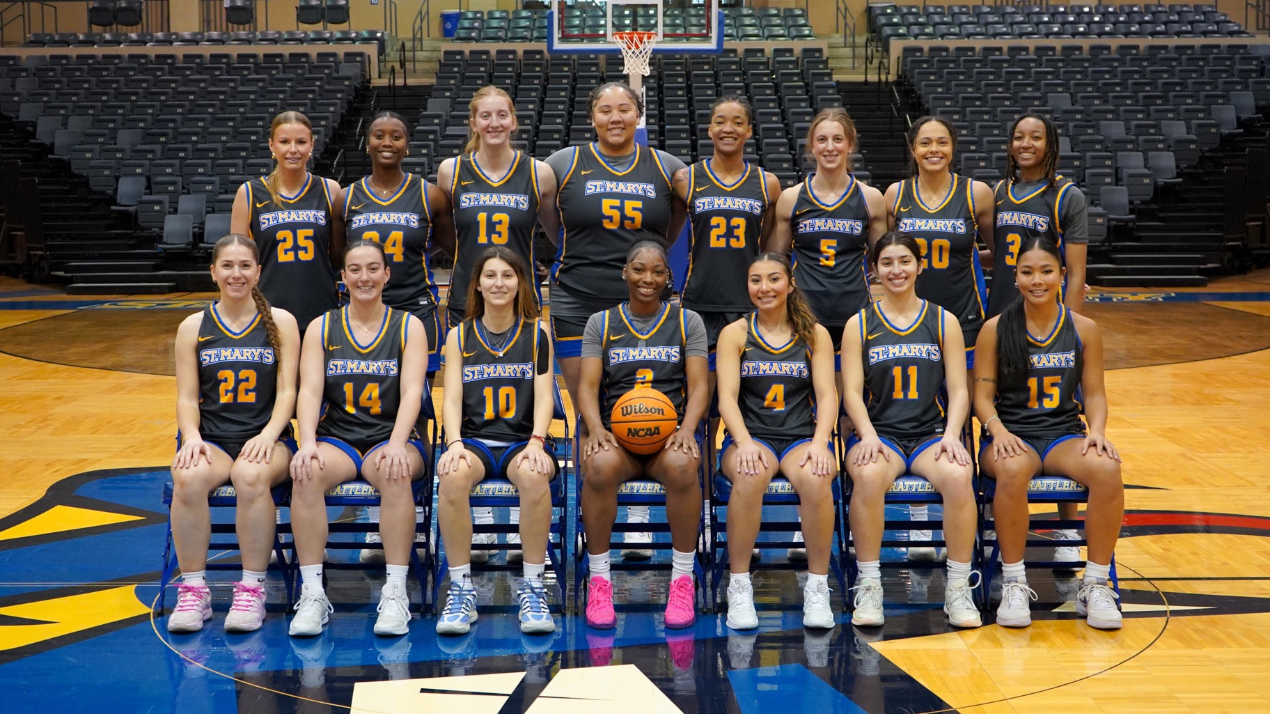 The 2025-26 Women's Basketball team poses in two rows.