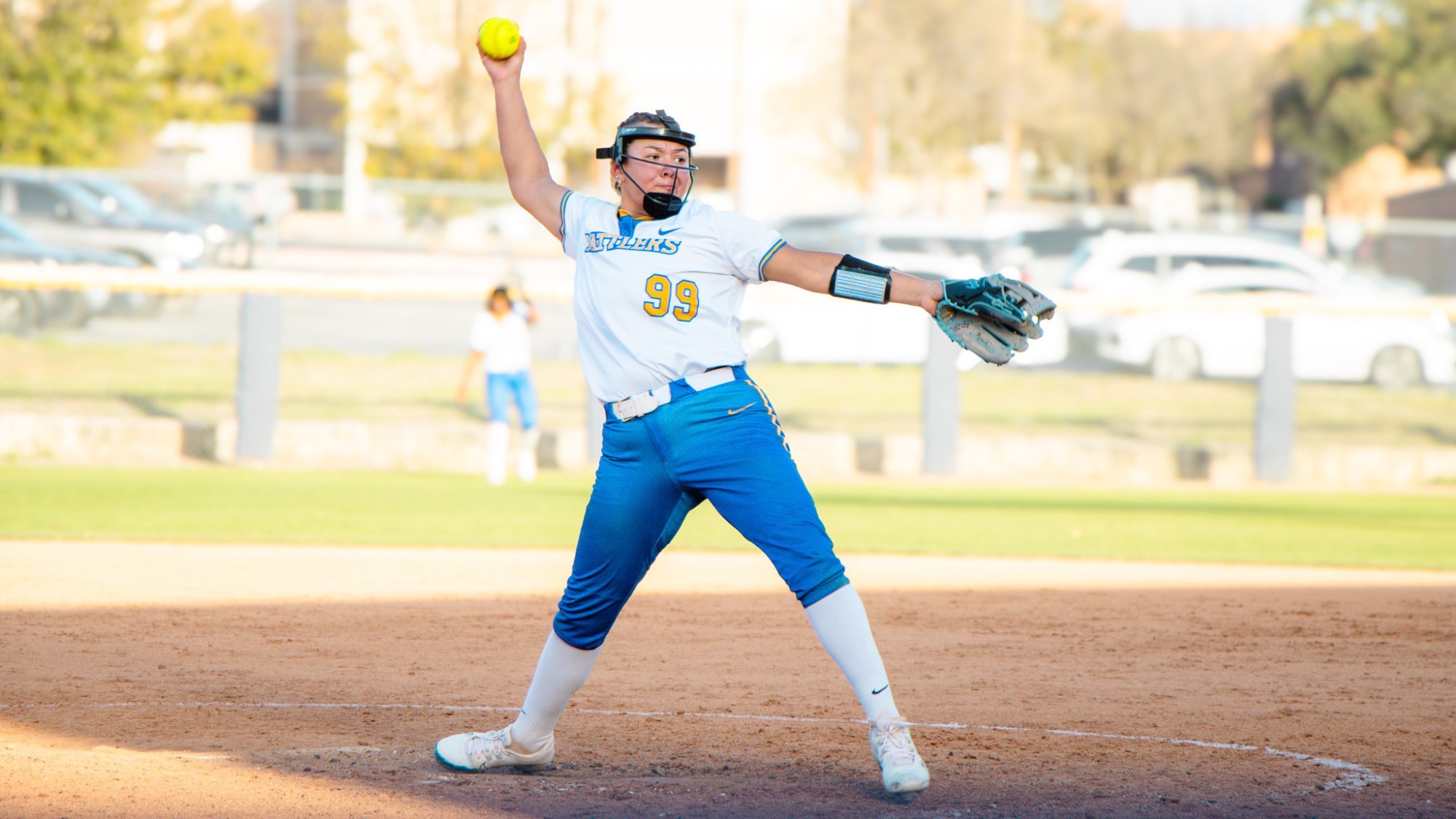 Emily Ayala pitches a ball to homeplate.