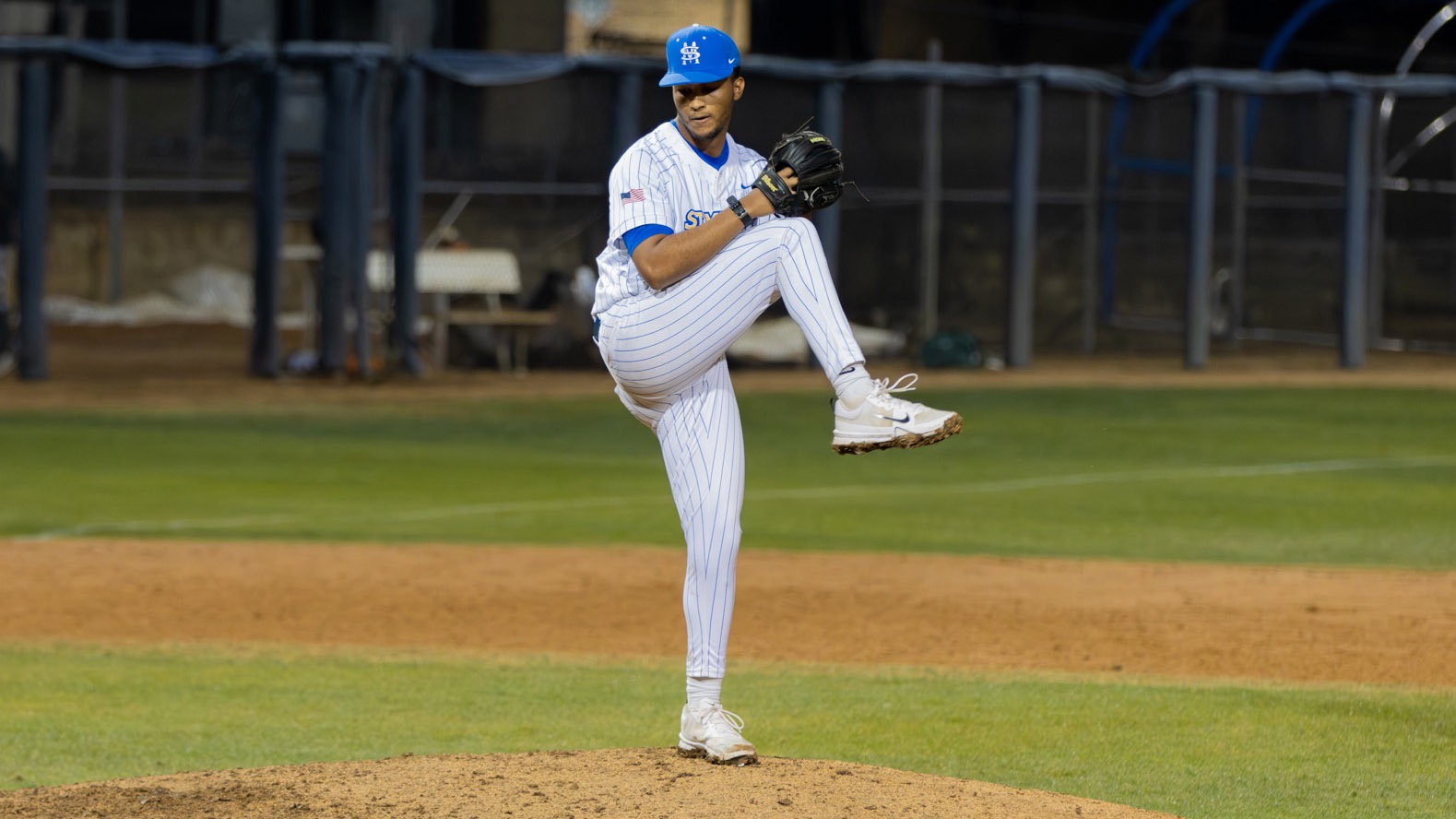 Gabe Cook begins his pitching delivery to home plate.