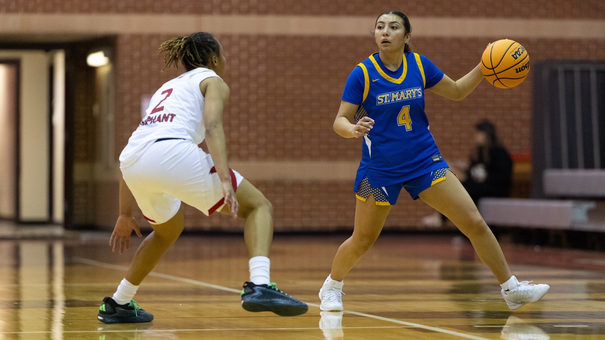 Brianna Vargas dribbles the ball at UIW