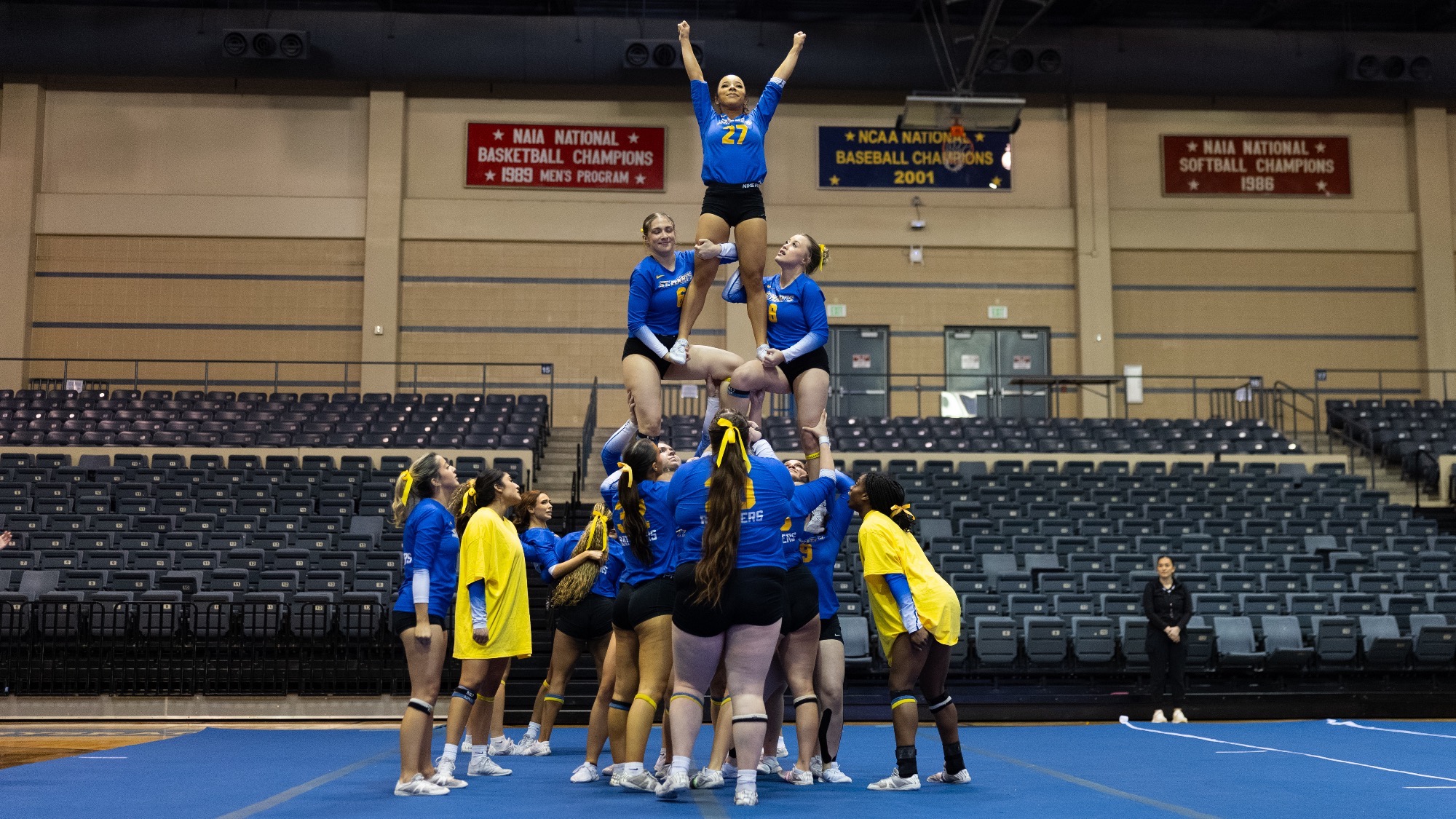 The STUNT team completes a pyramid with Alecka Brown at the top during the Rattler Invitational.