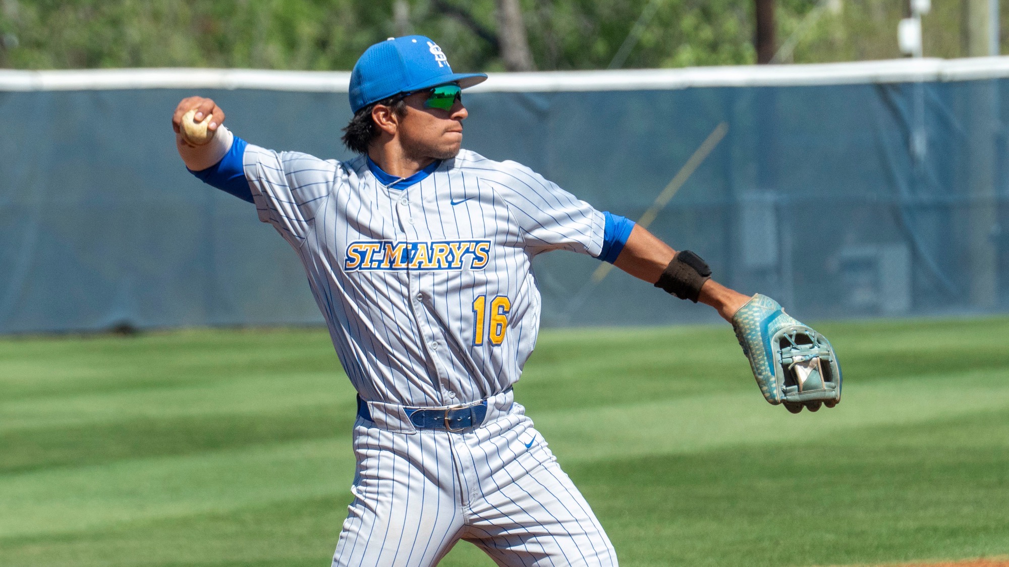 Matt Mendez throws the ball to first base.