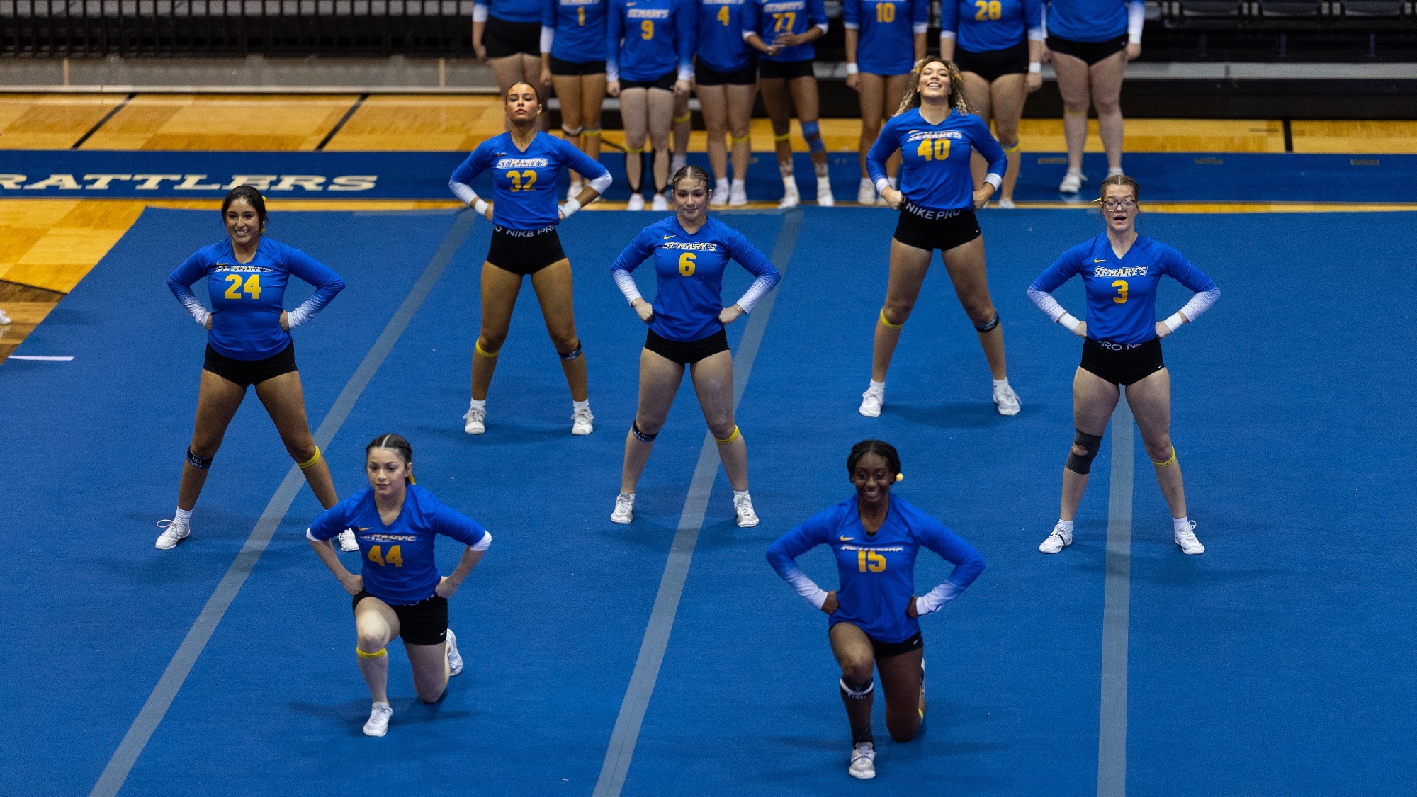 The STUNT team finishes a routine in jumps & tumbling