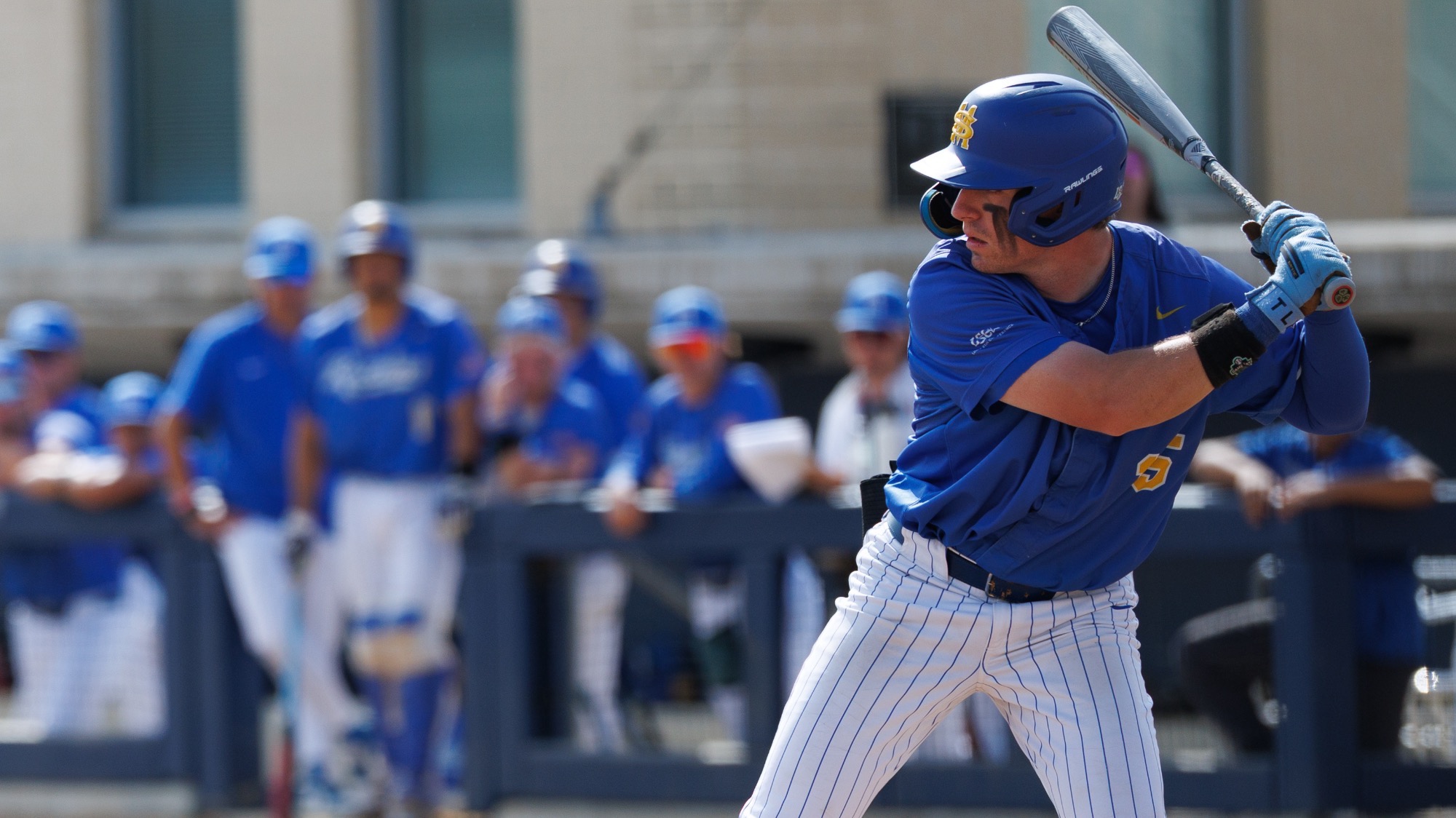 Garrett Brooks stands in the batter's box waiting on a pitch.
