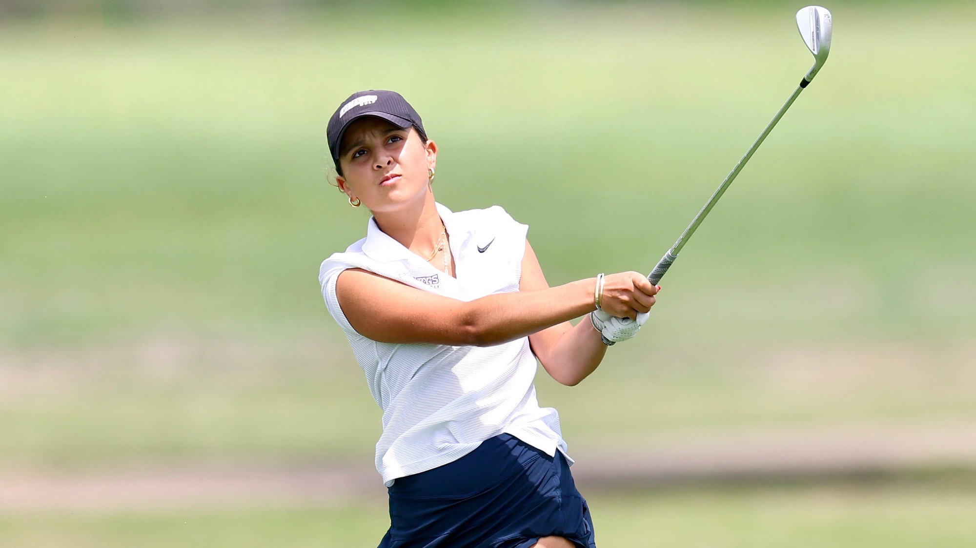 Manon Verret follows through on a shot at the LSC Championship