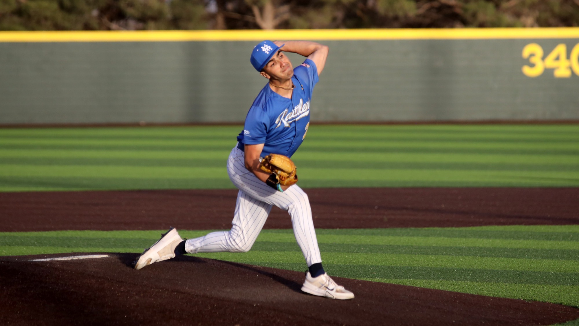Joel Burgess delivers a pitch to home plate.