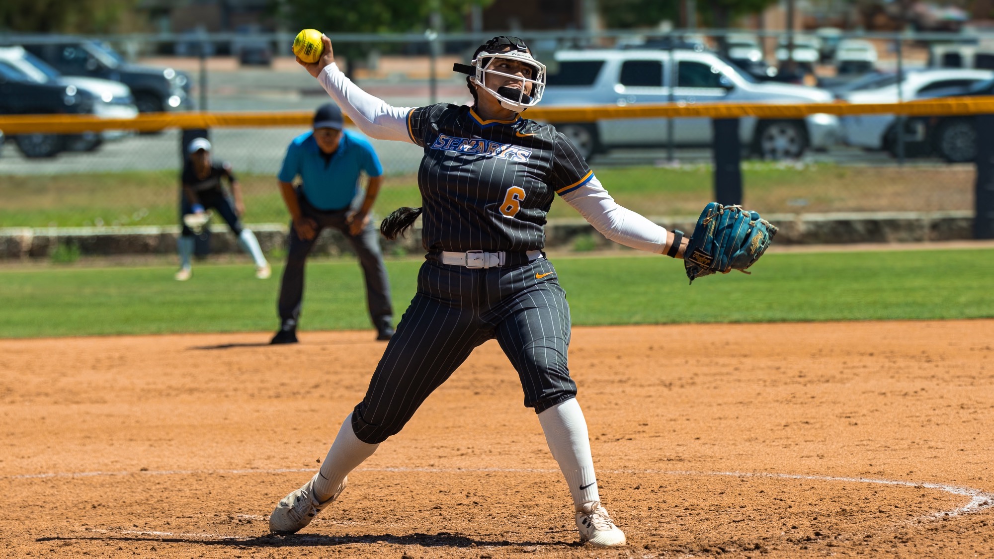 Ariella Saenz delivers a pitch to home plate.