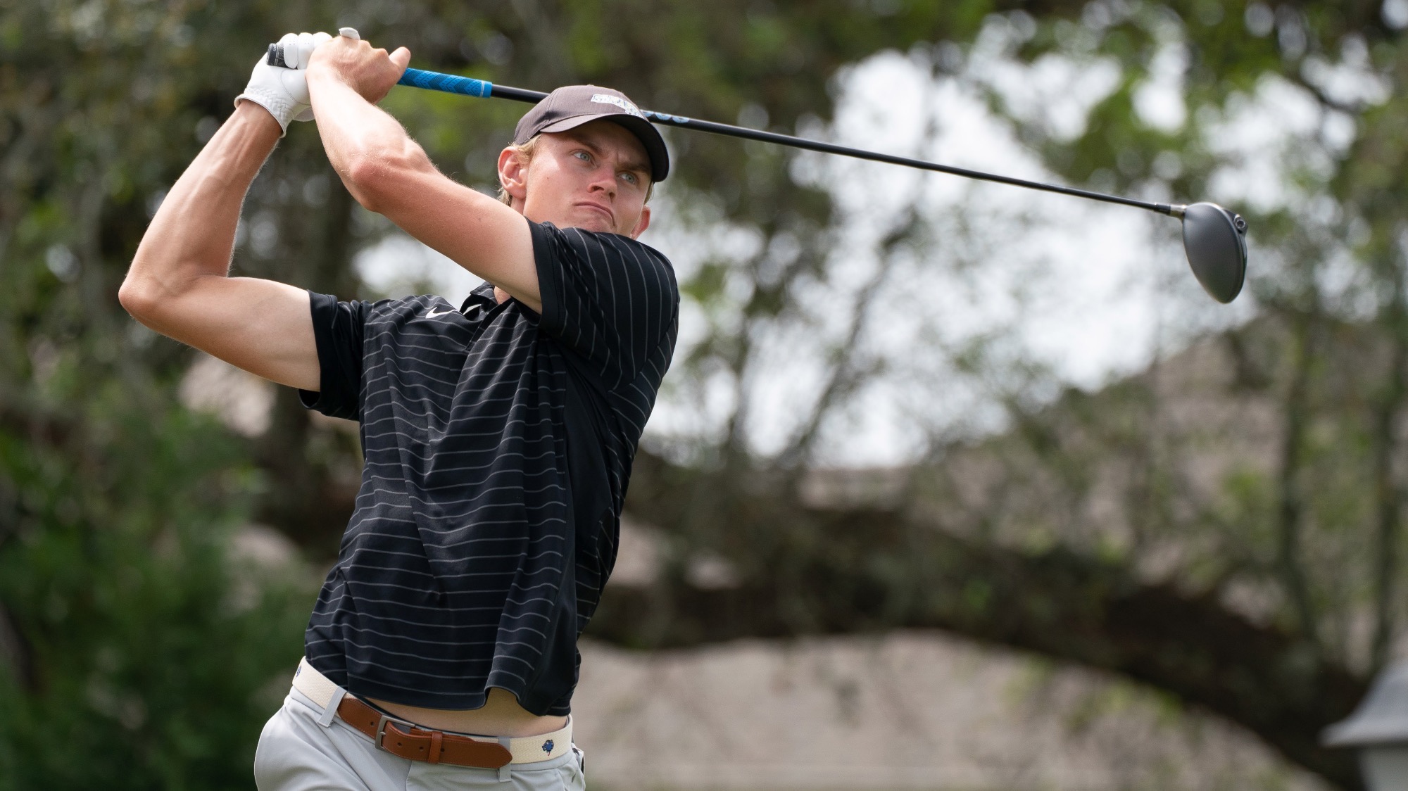 Philip Hallstrom follows through from a tee shot at the Argonaut Invitational.