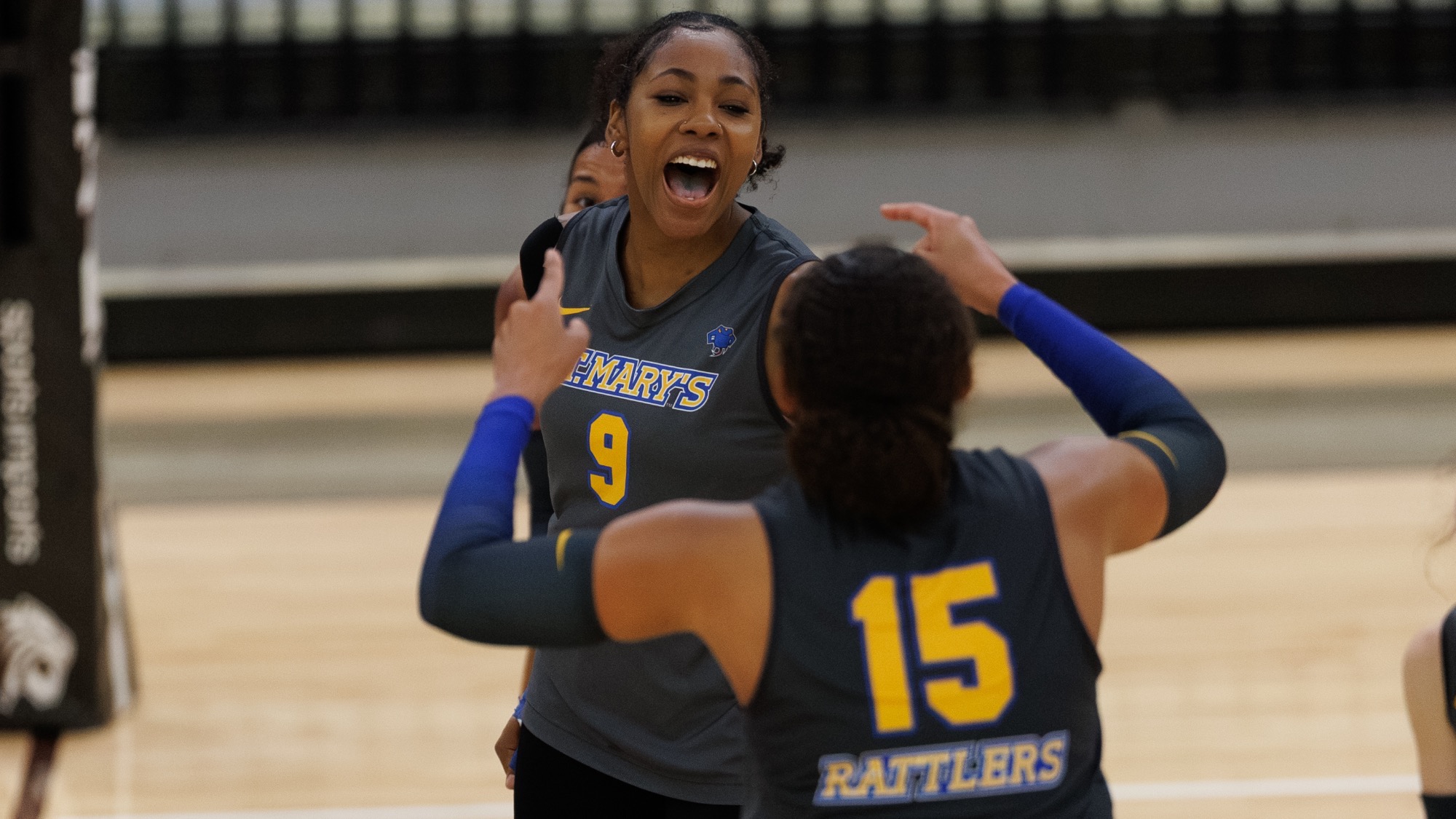 Olivia Rubio celebrates winning a point at Trinity