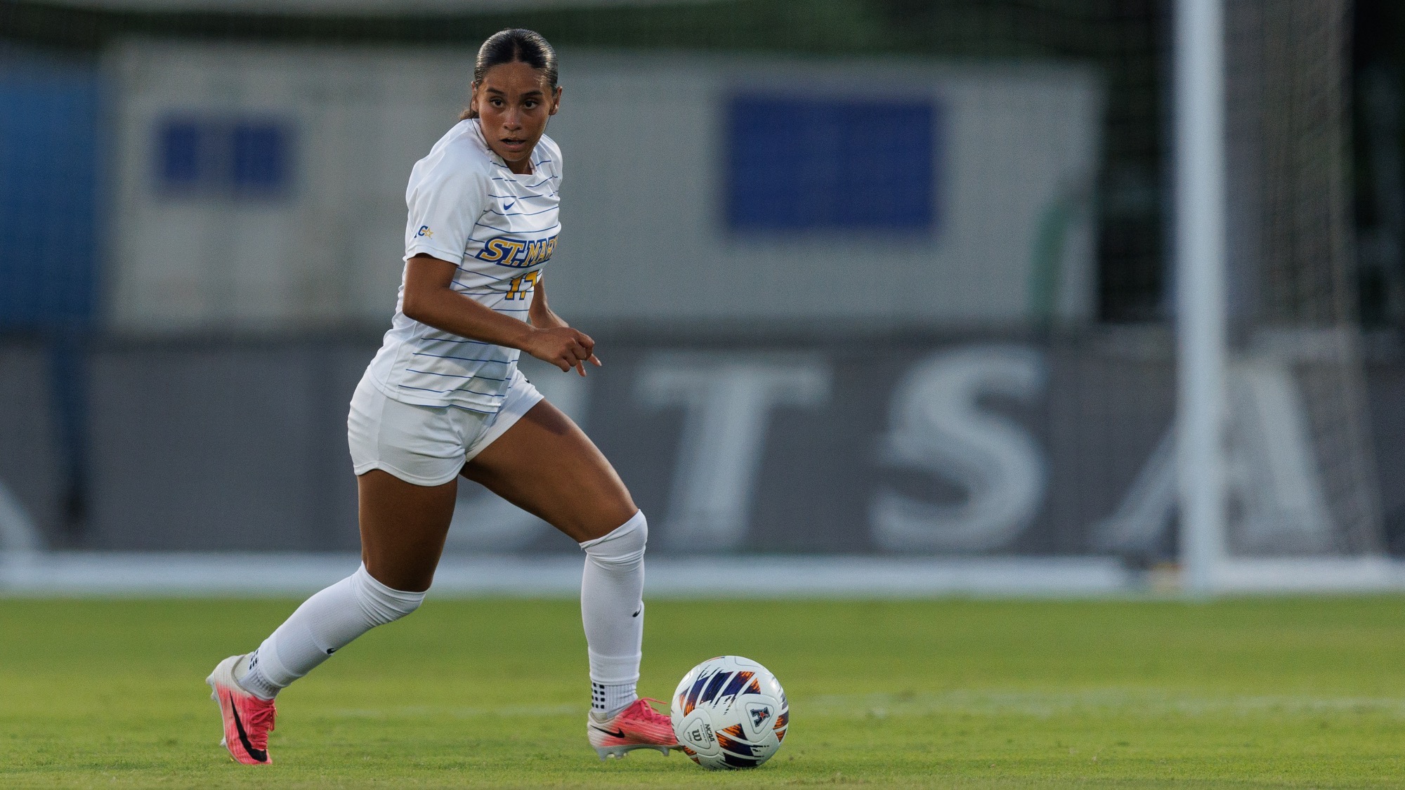 Victoria Morales looks downfield to find an open teammate to pass the ball to.