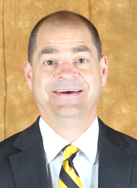 A headshot of St. Olaf College assistant men's hockey coach Jeff DeGree.