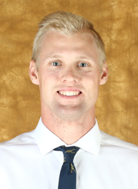 A headshot of St. Olaf Assistant Track & Field Coach Connor O'Neill.