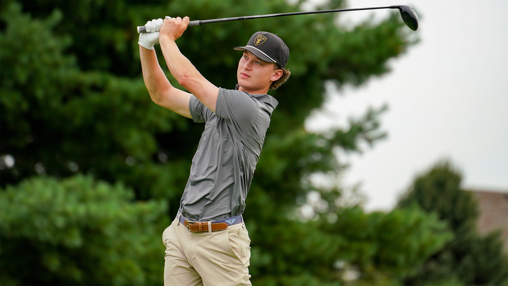 Will Black hits a drive.