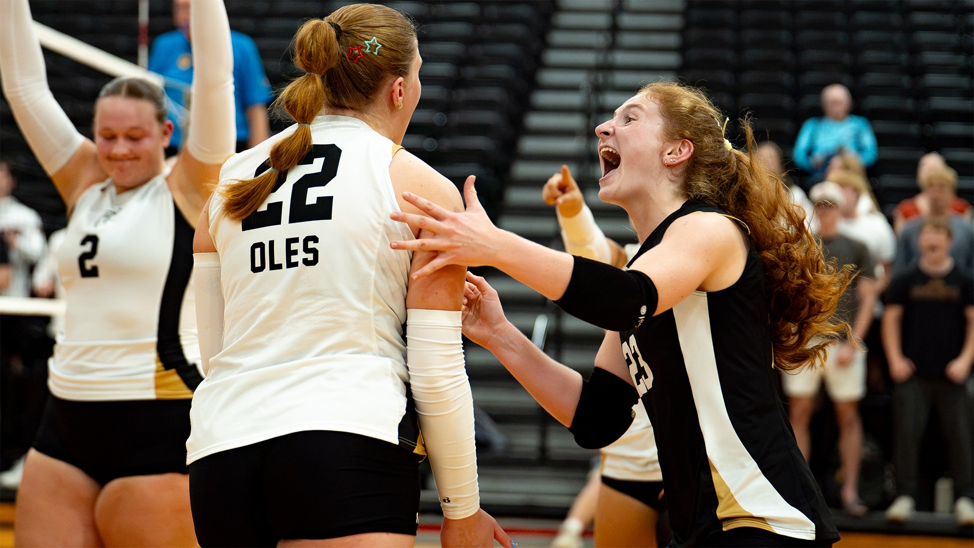Michaela Dooley and Evelyn Kreft celebrate winning a point.