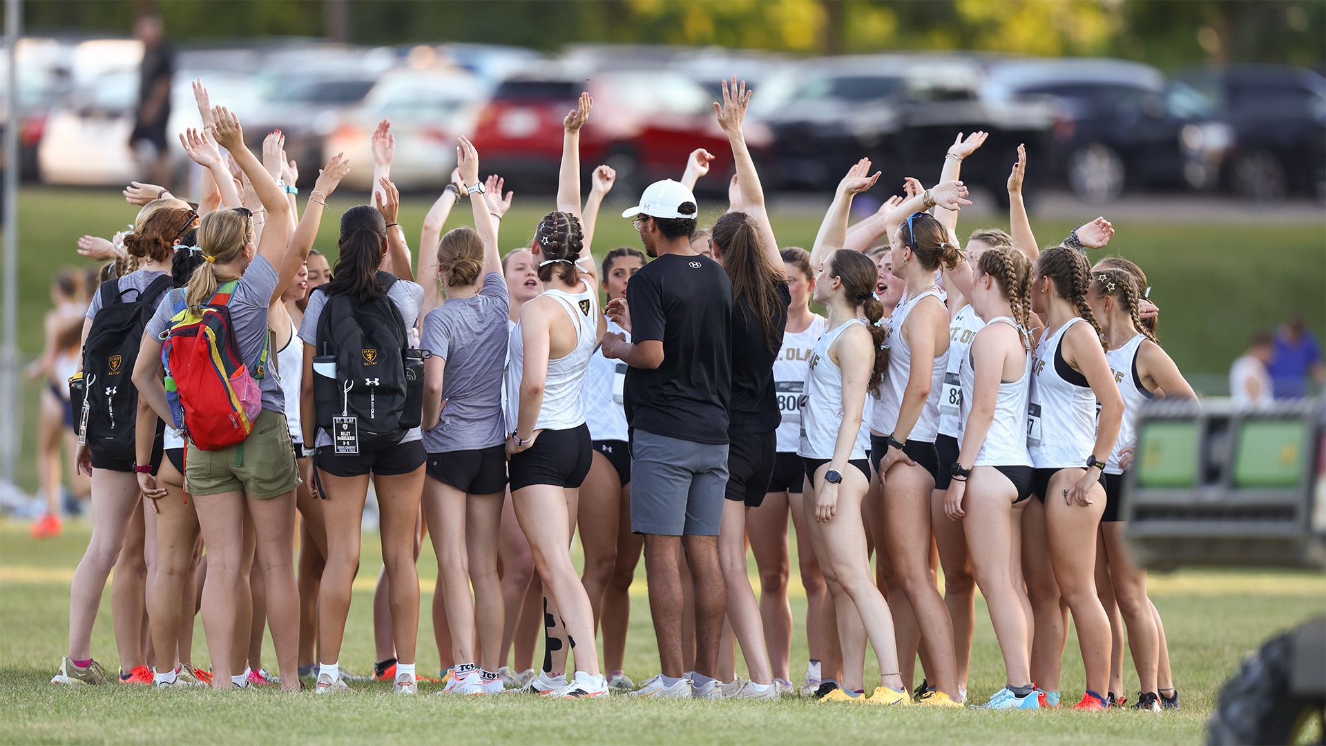 The St. Olaf women's cross country team does it pre-race cheer.