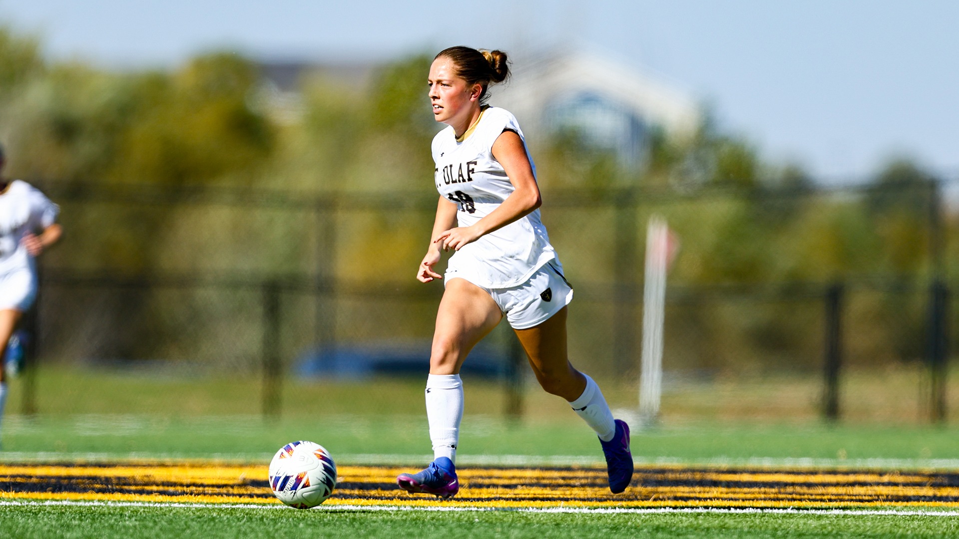 Lillian Miller looks for a pass.