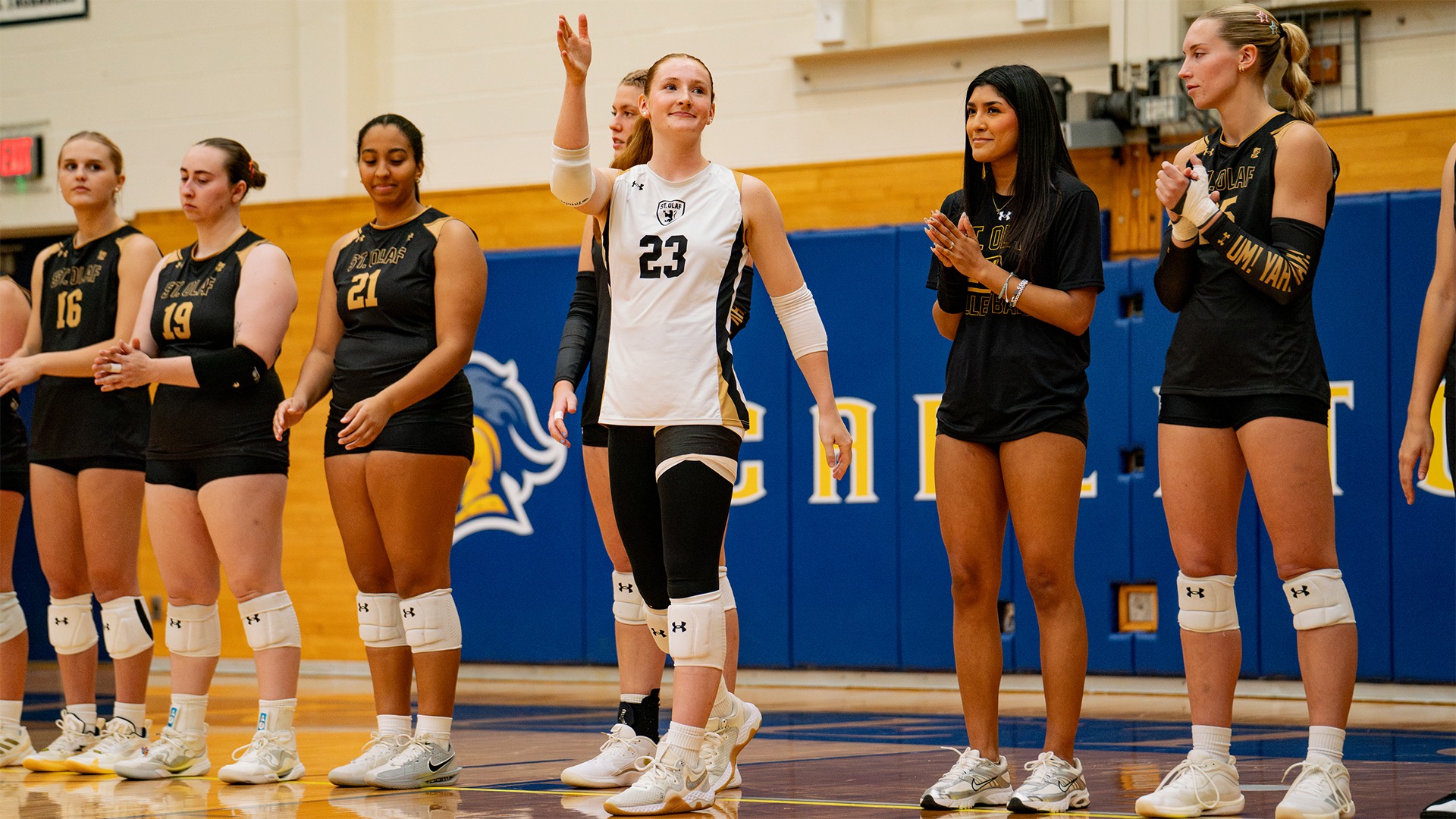 Michaela Dooley waves to the crowd during introductions.