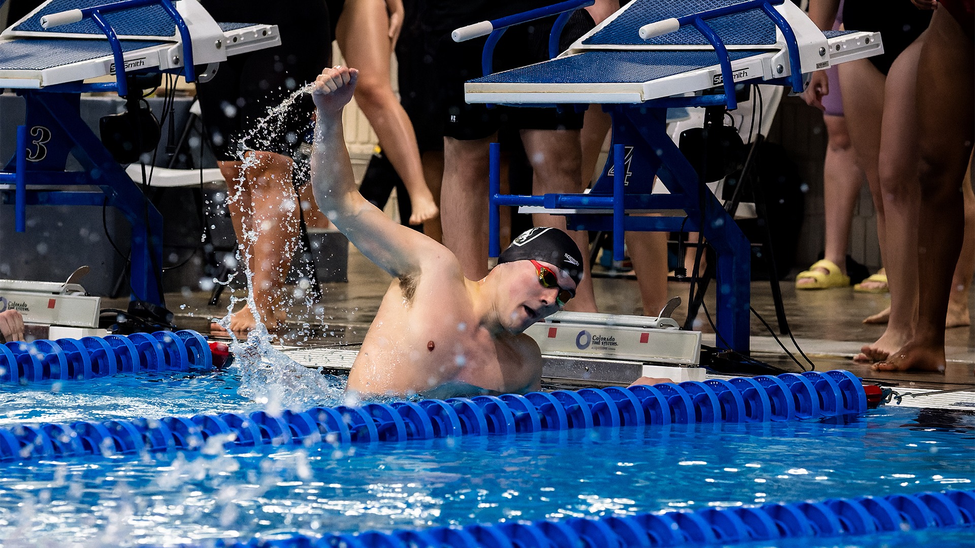 Sam Reilly smacks the water after a race.