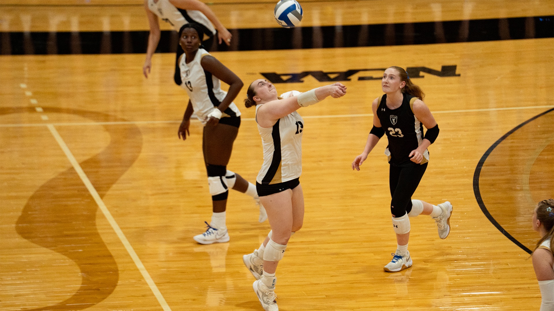 Sophie Saxton bump sets the ball.