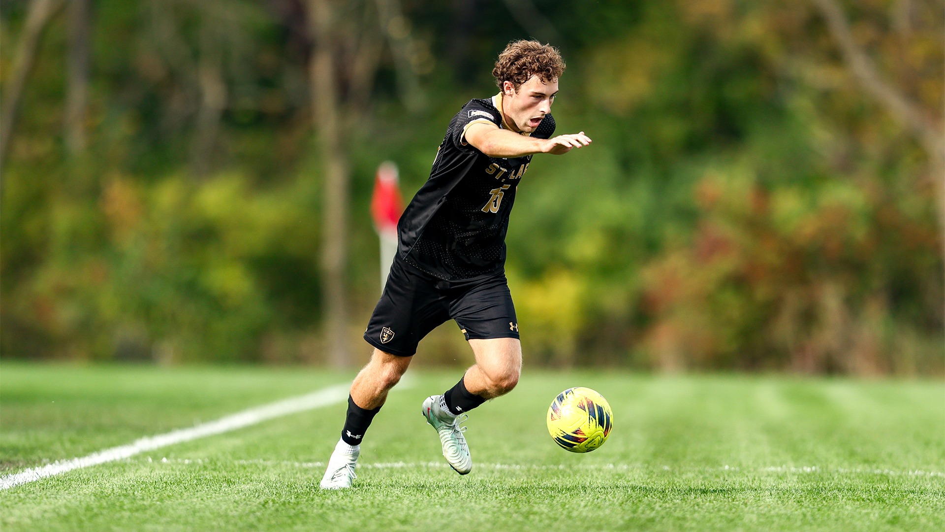 Tustin Todd dribbles the ball.