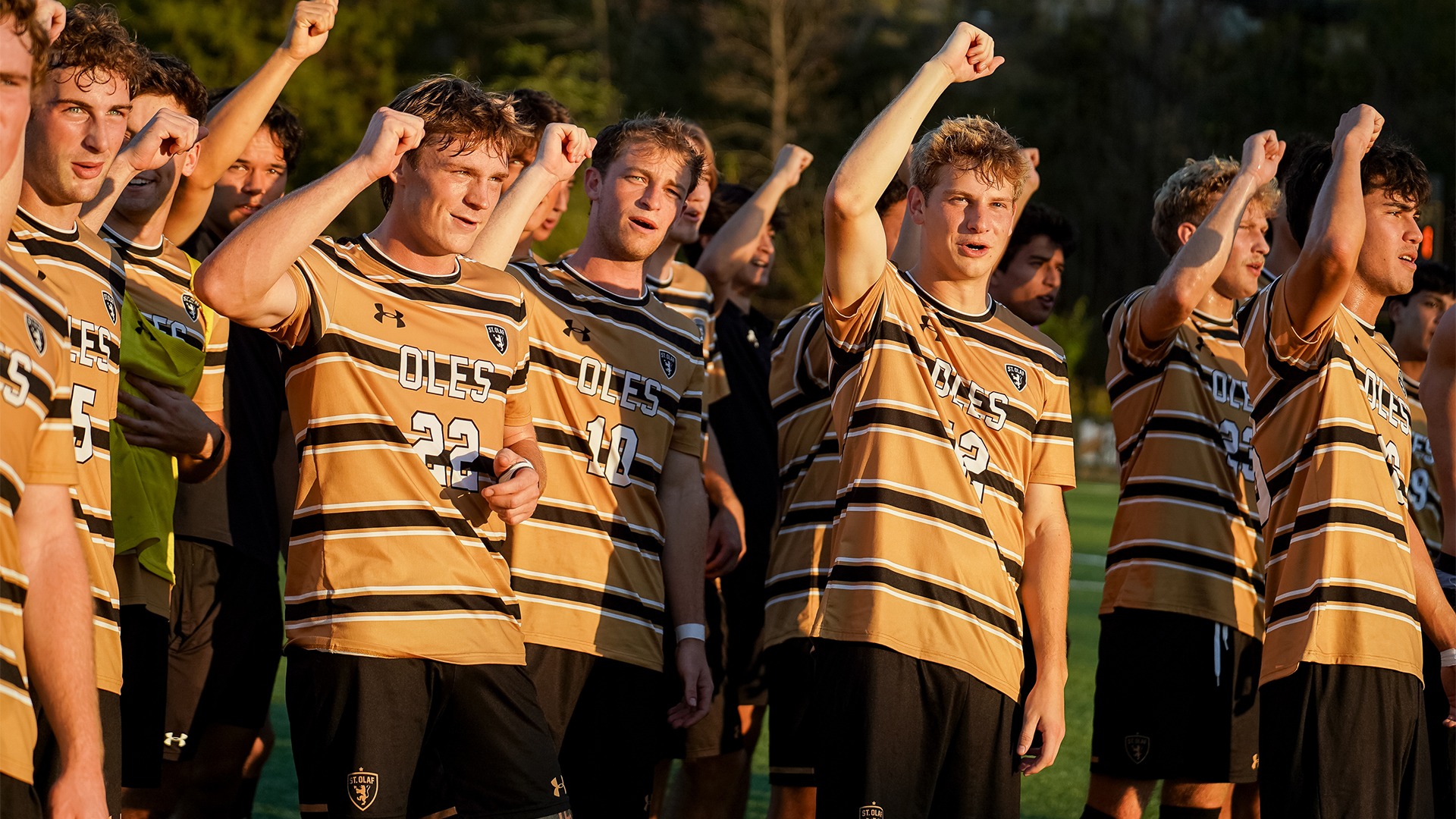 The St. Olaf men's soccer team sings Um! Yah! Yah! after a win.