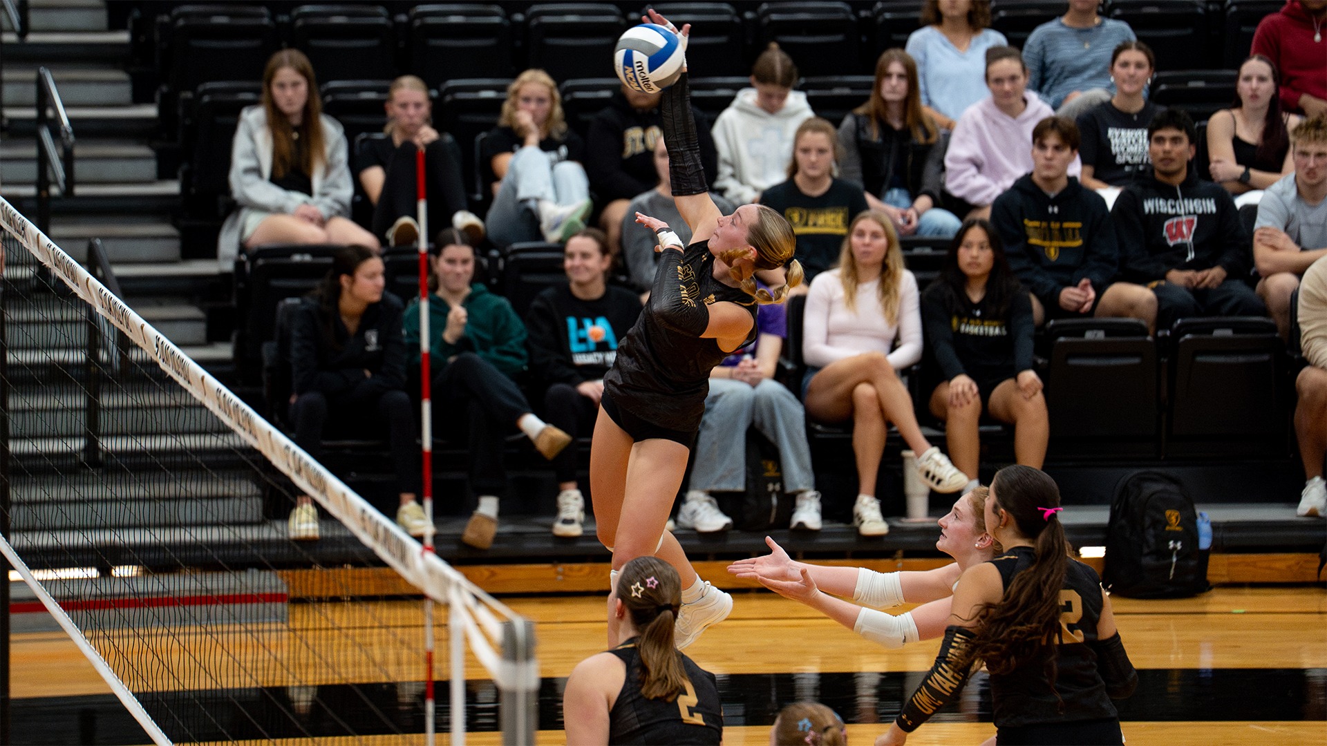 Maren Miller takes a swing against UW-Superior.