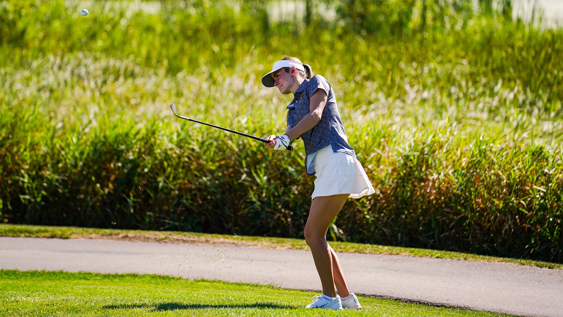 Aliyah Kleven hits a chip shot.