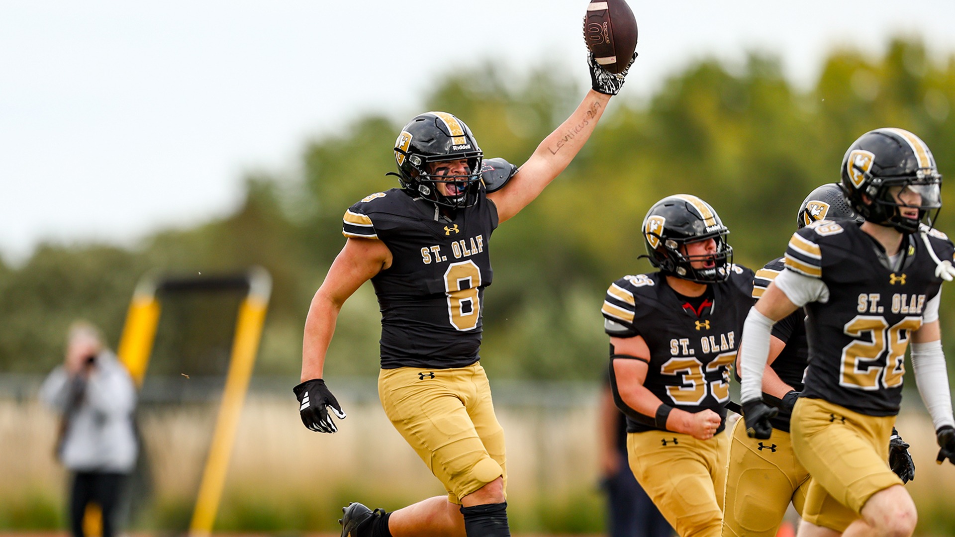 Tytan Small celebrates a fumble recovery.