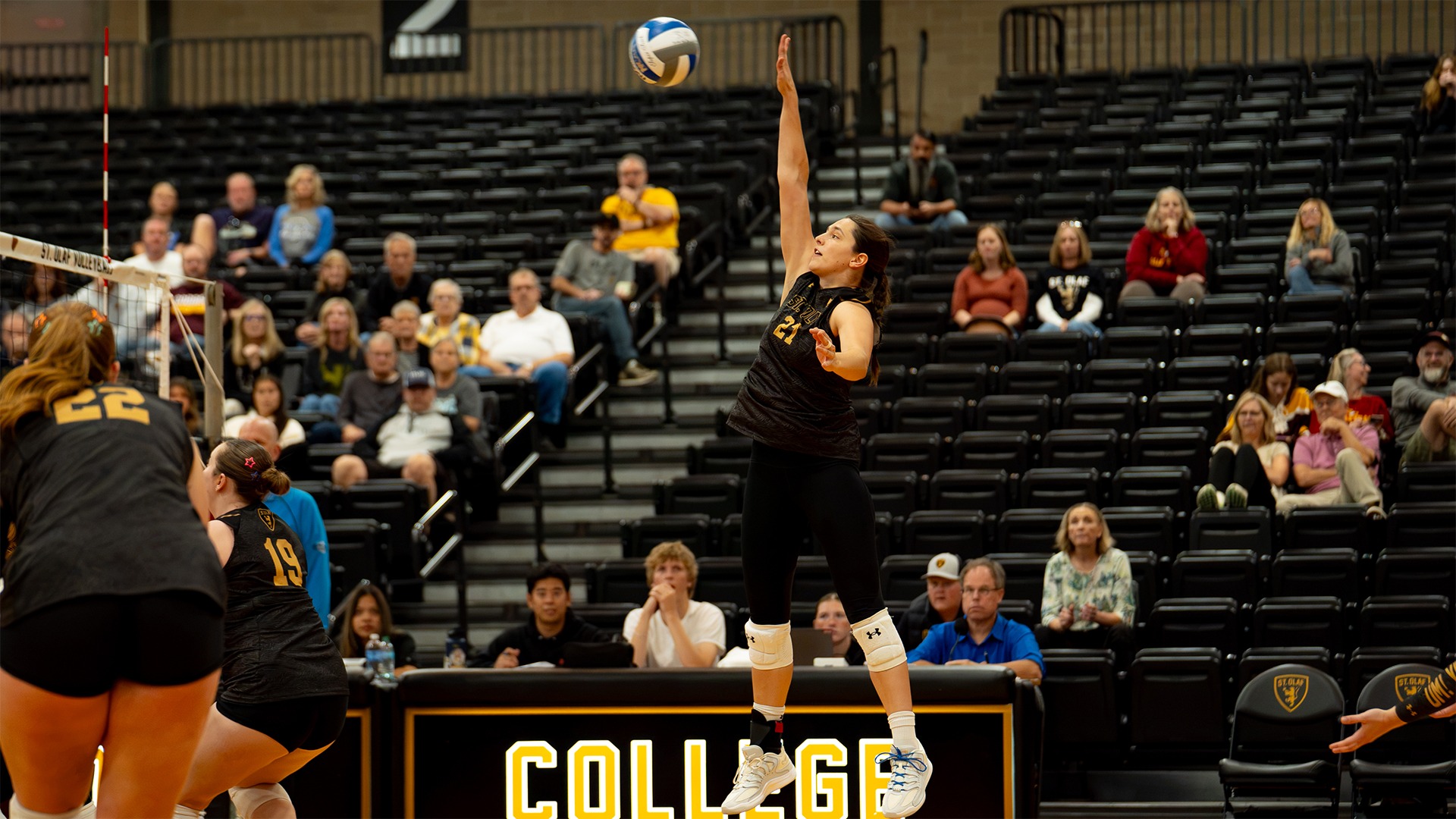 Lilah Van Scoyoc goes up for a swing.