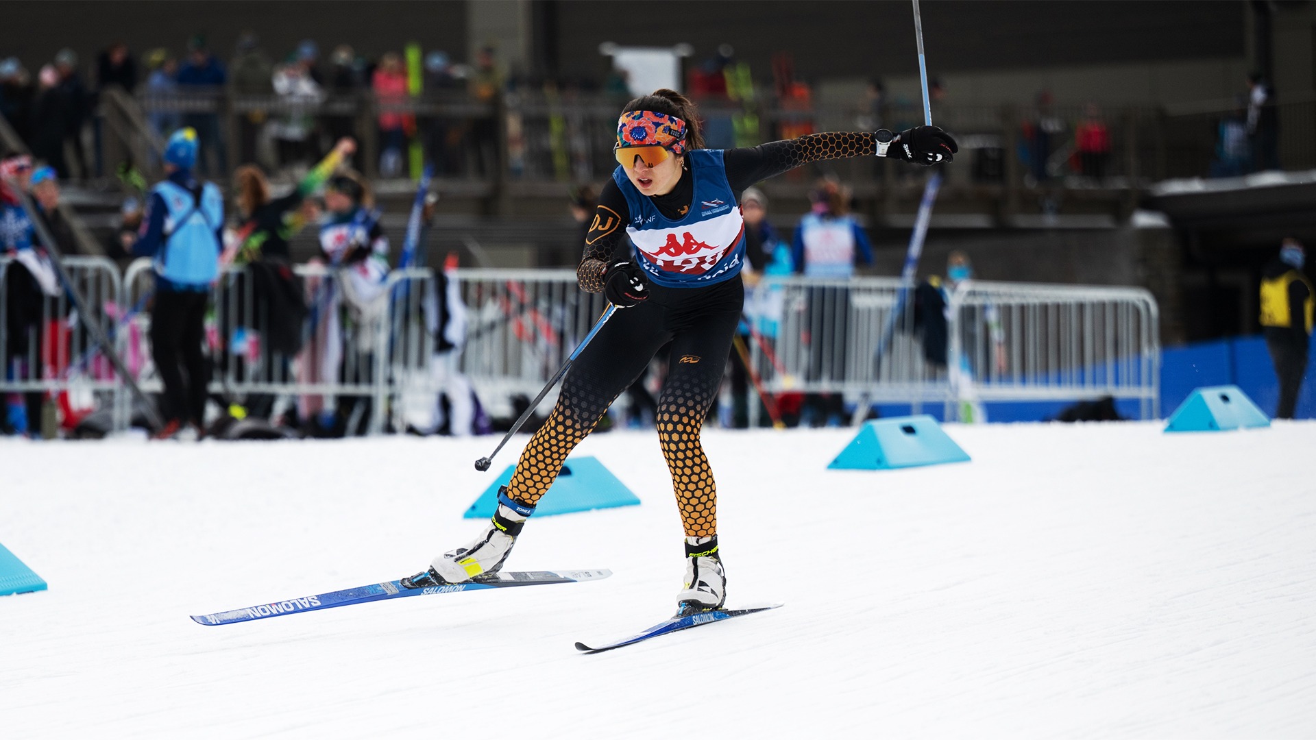 Amae Kam-Magruder skis towards the finish line.