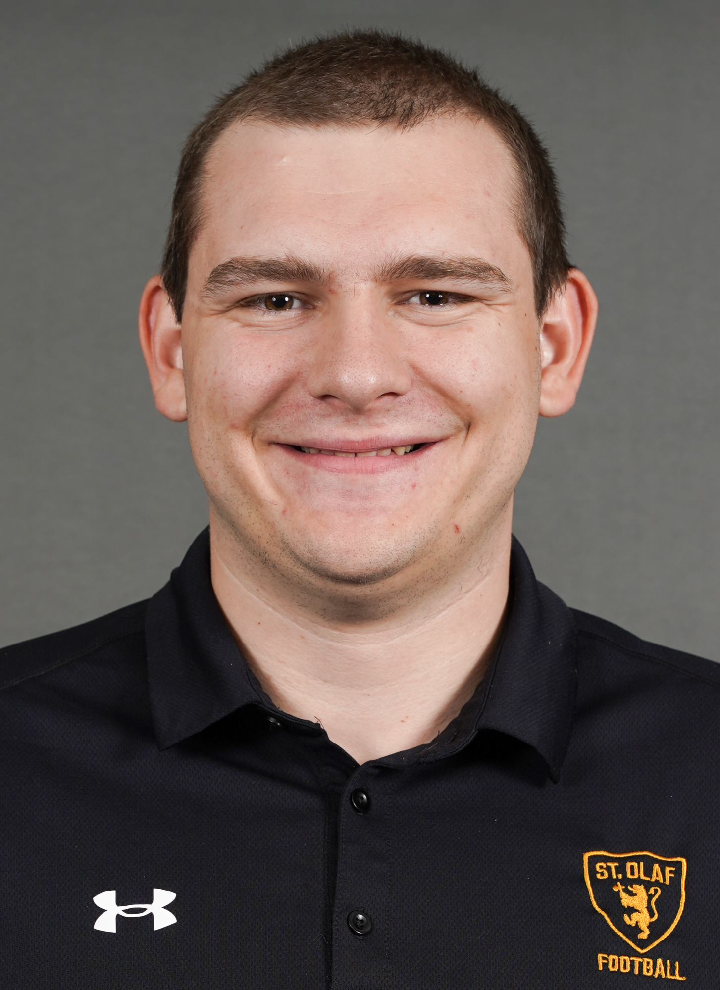 A headshot of student coach Nathan Phillips of the St. Olaf football team.