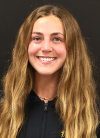 A headshot of St. Olaf volleyball assistant coach Kyah Olson-Solva.