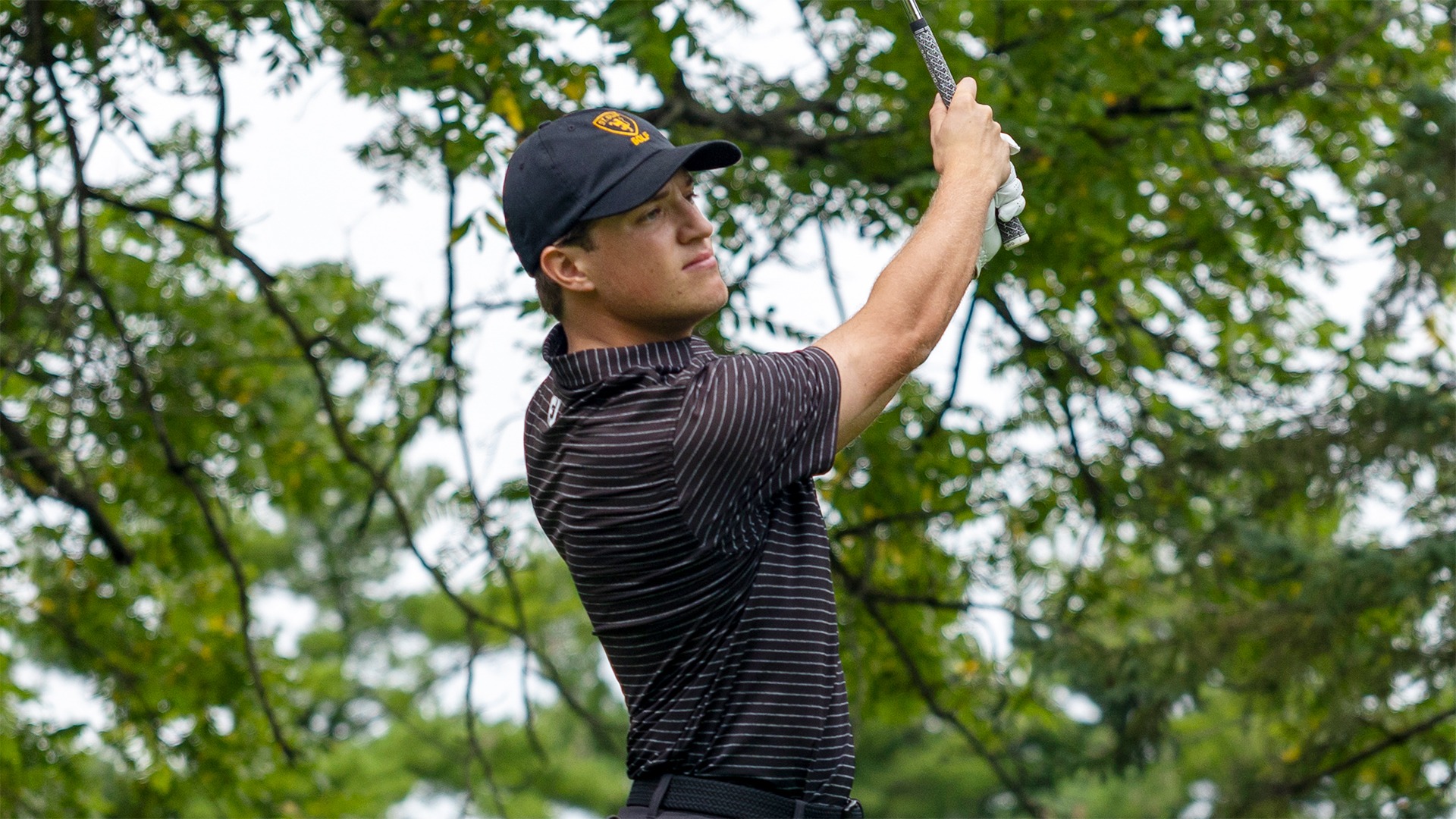 Isaac Schmidt watches one of his shots.