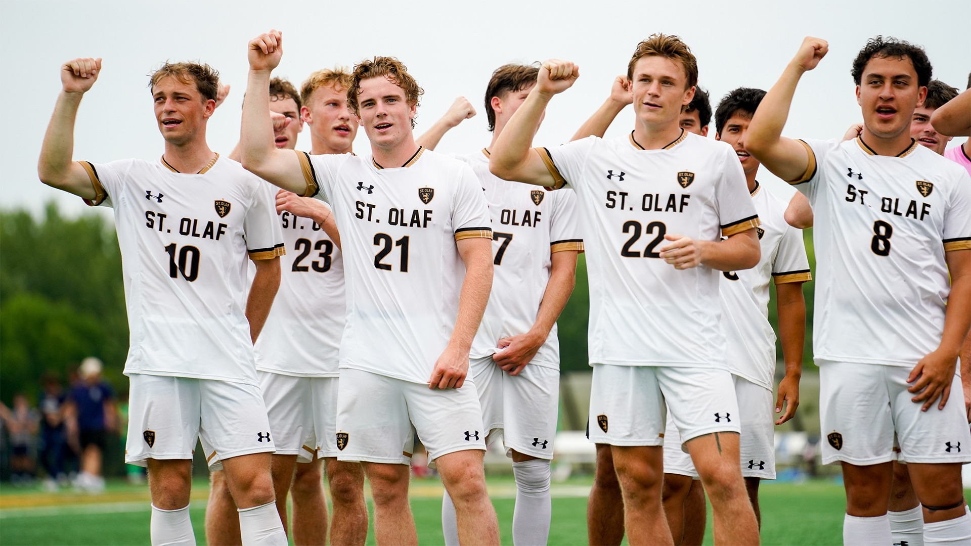 Men's soccer sings Um! Yah! Yah! after a win.
