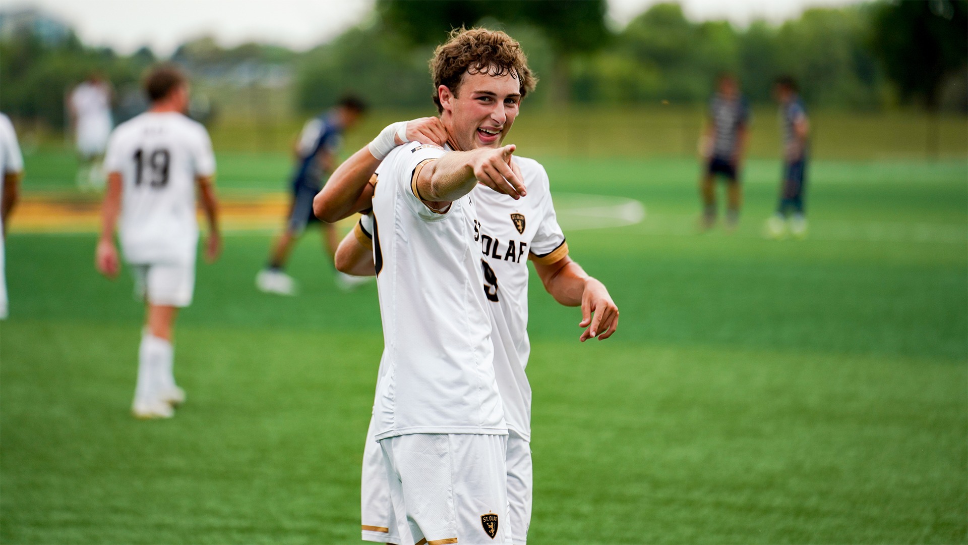 Tustin Todd points at the camera.