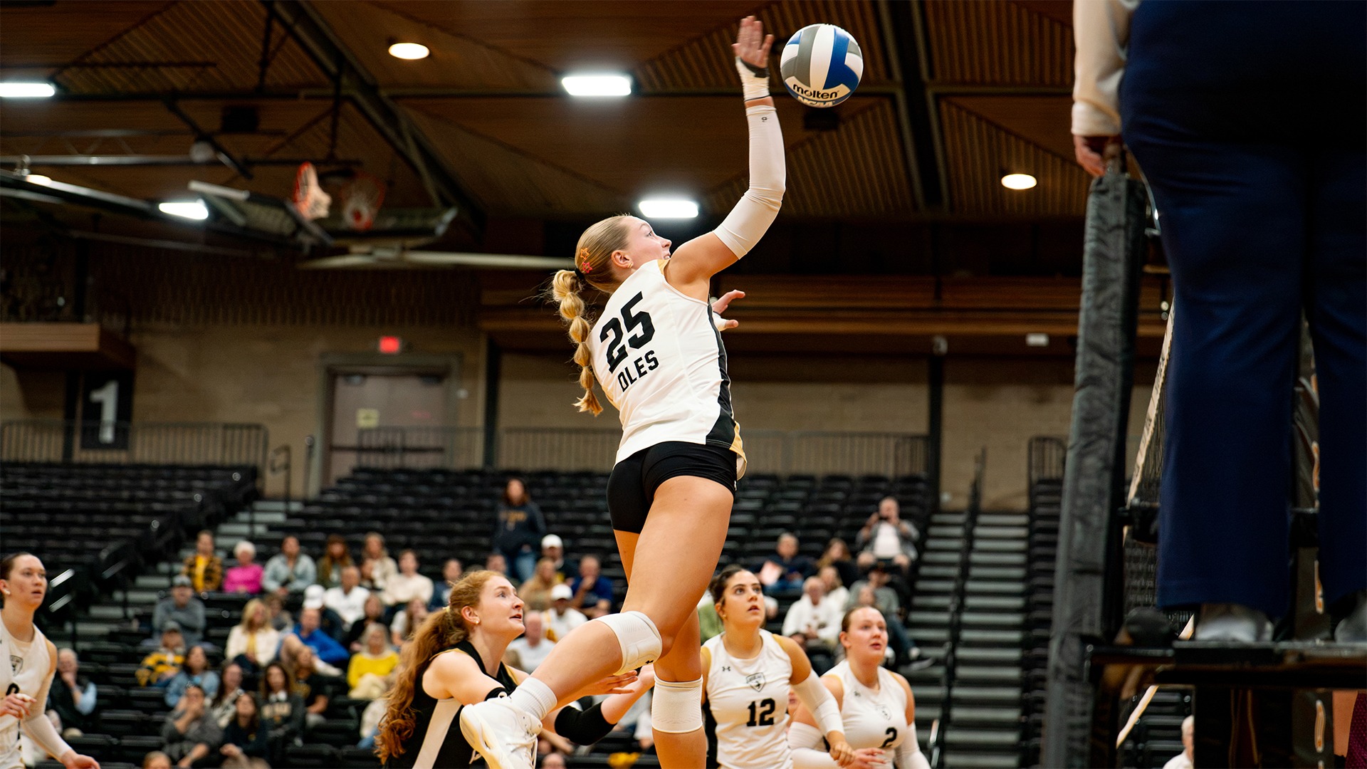 Maren Miller hits the ball.