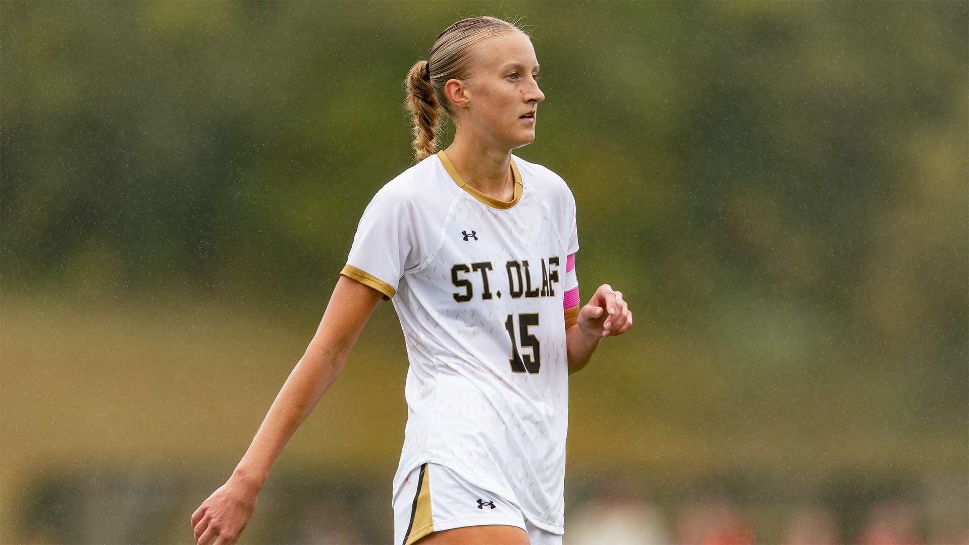 Emily Johnson stands in the rain.