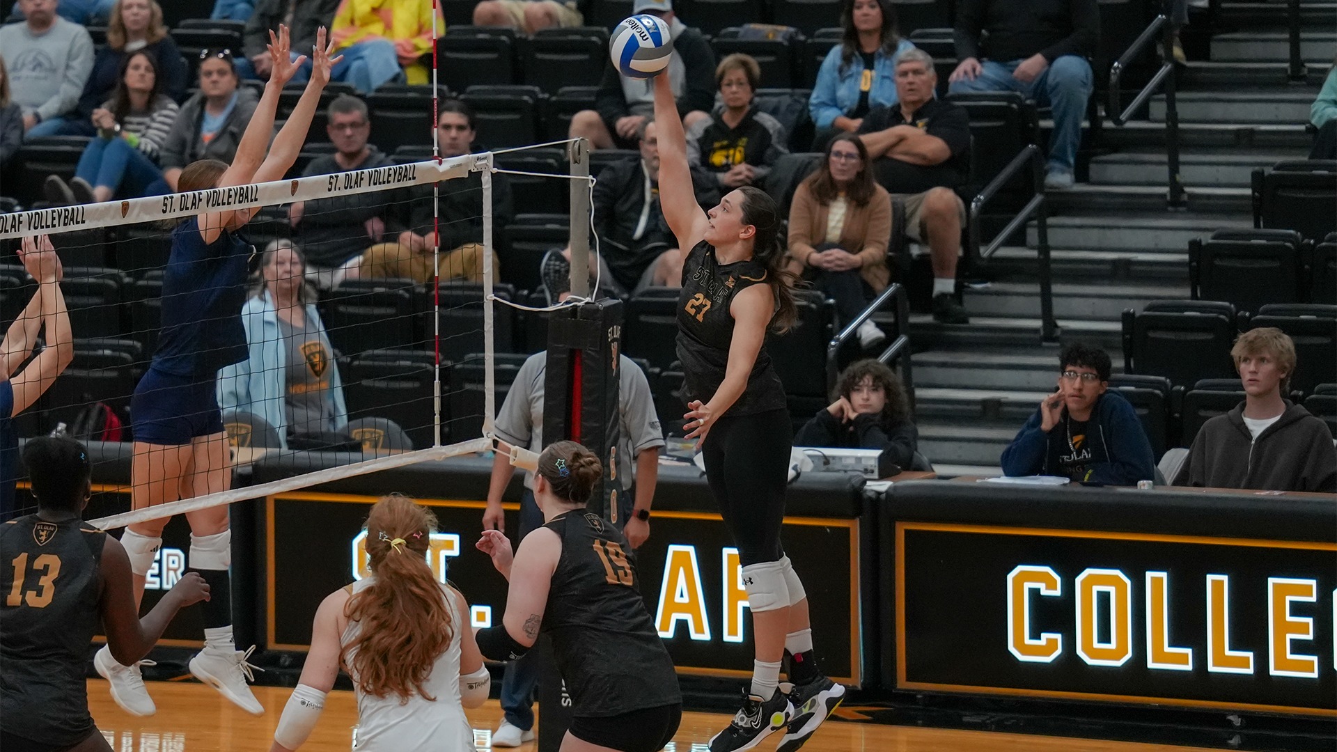 Lilah Van Scoyoc goes up for a kill.
